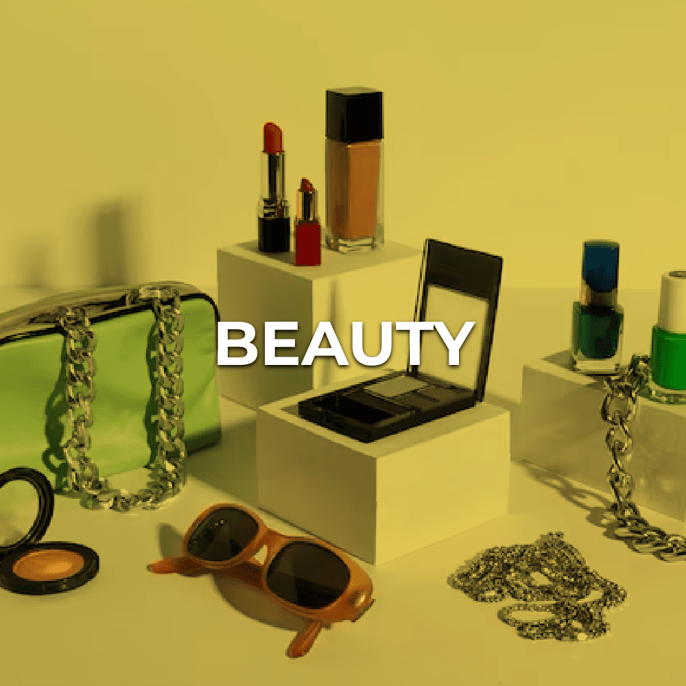 A table with cosmetics and sunglasses on it.