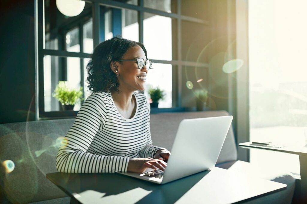 A woman working on her laptop